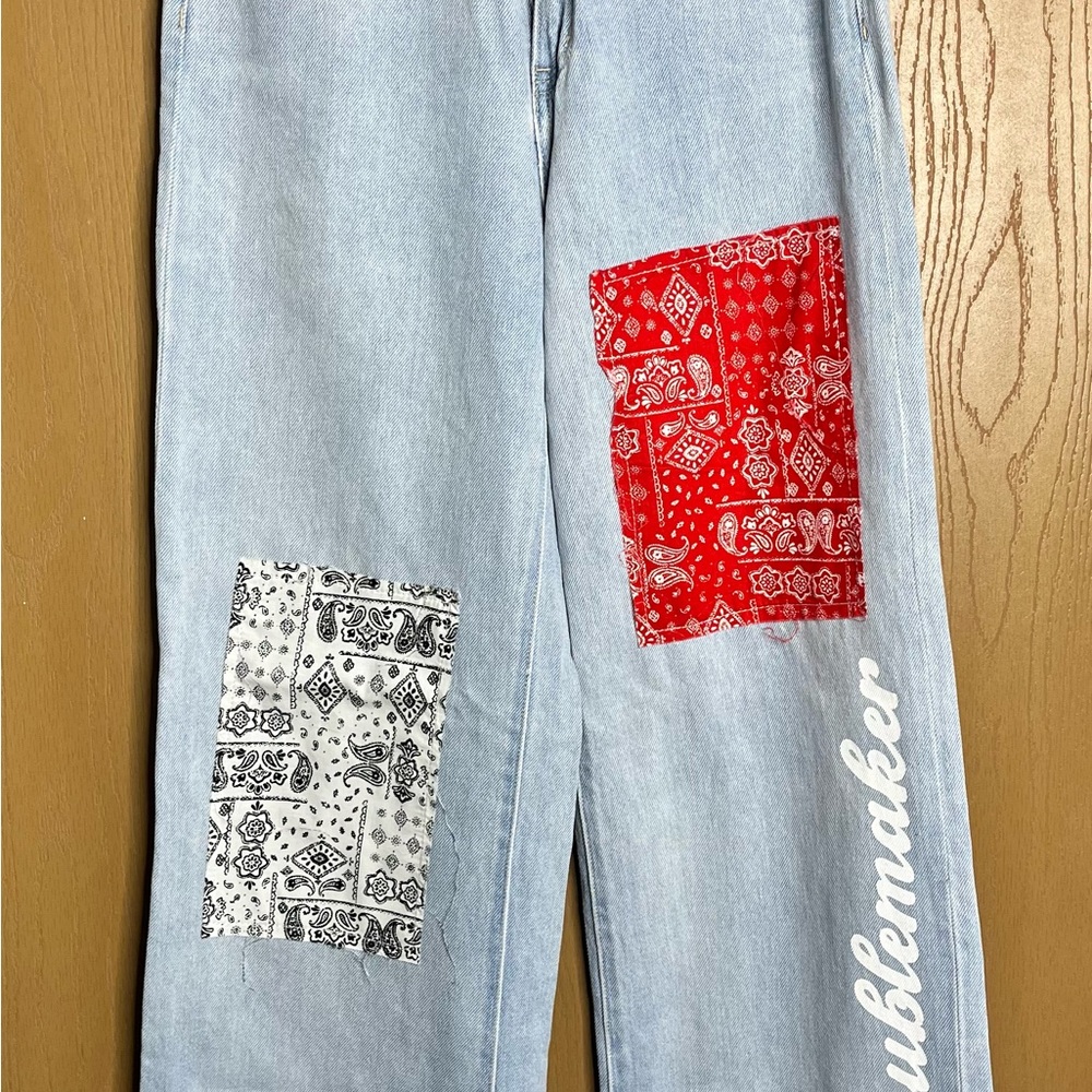 Adika Light Blue Jeans with Red and Black Patches